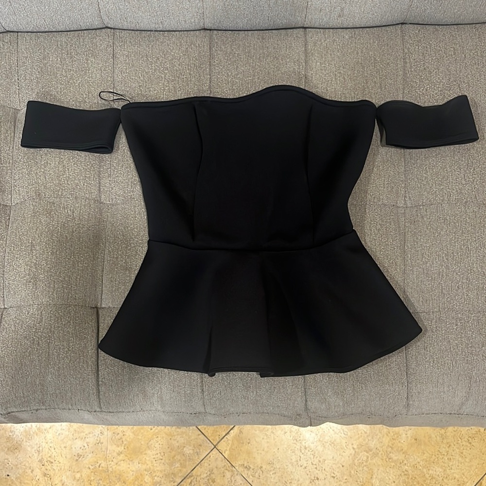 Guess brand size S peplum top with cuff shoulders